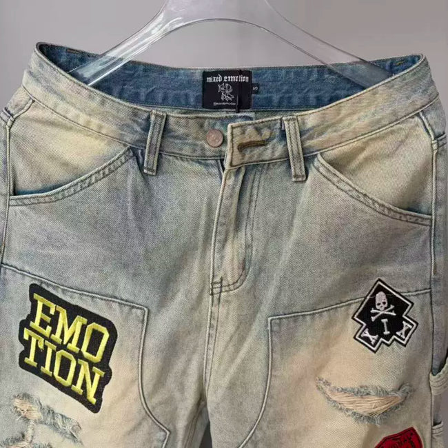 Mixed Emotion Multi‑Patch Distressed Carpenter Jeans Main Image
